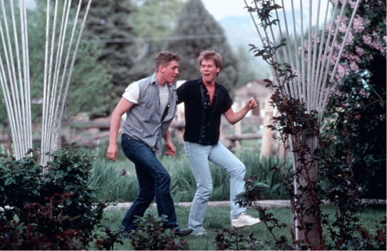 Kevin Bacon teaching Chris Penn how to dance in Footloose