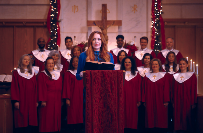 Avery (Lindsay Lohan) stands uncomfortably in front of the church congregation