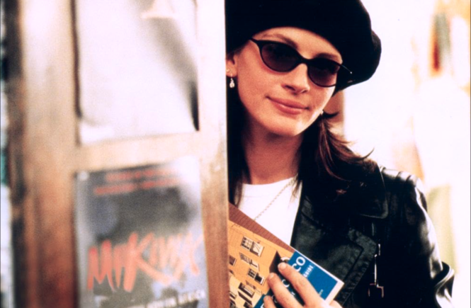 Anna Scott, peers out from behind sunglasses at the bookstore